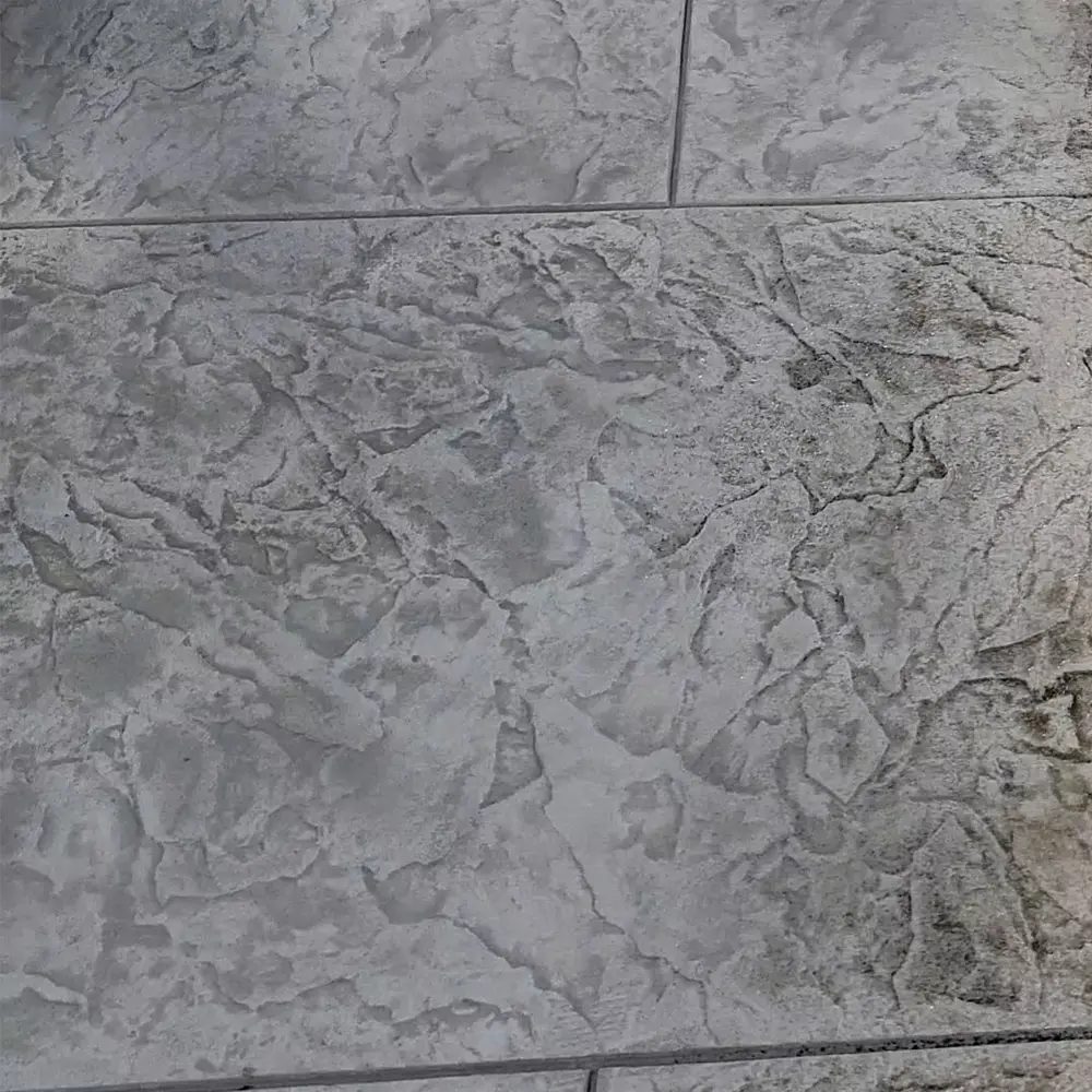 Field Stone Paver Magnetic stamped concrete with dry Mocha EZ-Tique before sealing