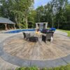 Sunburst Reclaimed Timber Concrete pool with patio chairs