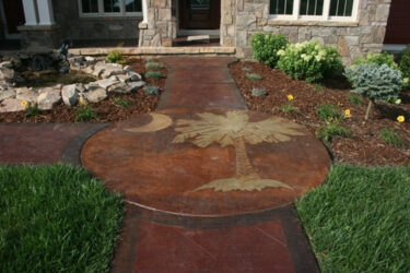 Job by Harp Legacy Concrete concrete patio and walkway with stamped palm tree