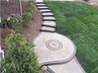 Compass Medallion (MD7401) by John's Cement concrete patio with compass medallion by John's Cement