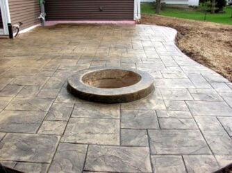 Ashlar Slate job by the Concrete Company Ashlar Slate Stamped Concrete Firepit
